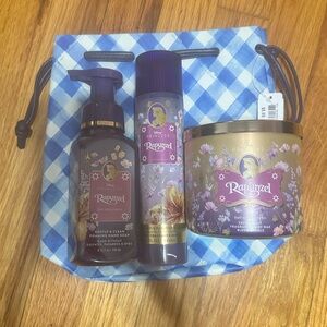 New 4 piece Disney Rapunzel bath and body works- candle, perfume, soap, and bag